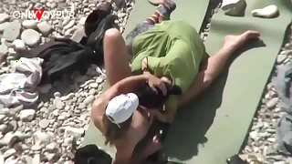 Seaside Voyeur&period; Unashamed nudists having sex exceeding the Seaside right near others